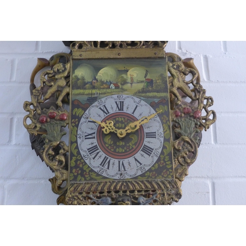 479 - Frisian wall clock, painted dial flanked by mermaids, complete with weights