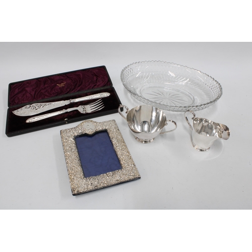 98B - Epns fish servers in a fitted case, Epns cream jug and sugar bowl, unmarked photograph frame (a/f) a... 