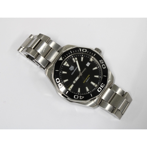 86 - TAG HEUER, Gents Aquaracer stainless steel wristwatch, signed black dial, back of case numbered WML3... 