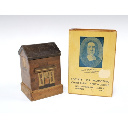 105 - Wooden money boxes, in the form of a book, 15cm, and the other inthe form of a house (2)