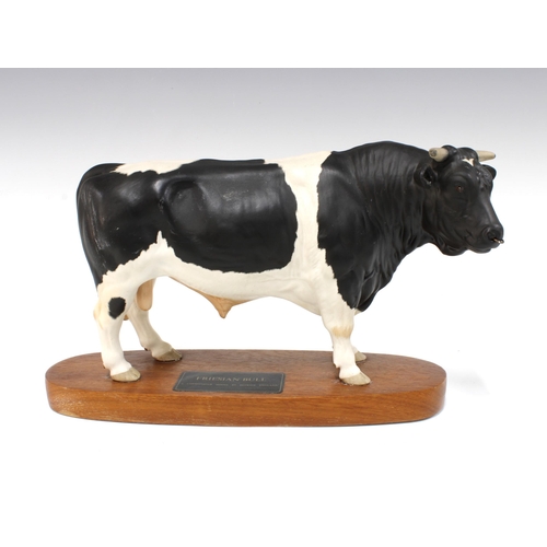 106 - Beswick Connoisseur model of a Friesian bull on wooden base, 19cm