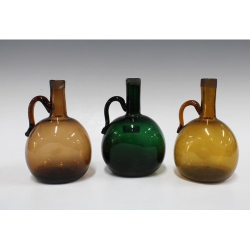 111 - Three 19th century coloured glass spirit  flagons to include two  amber and one Bristol green, 18cm ... 