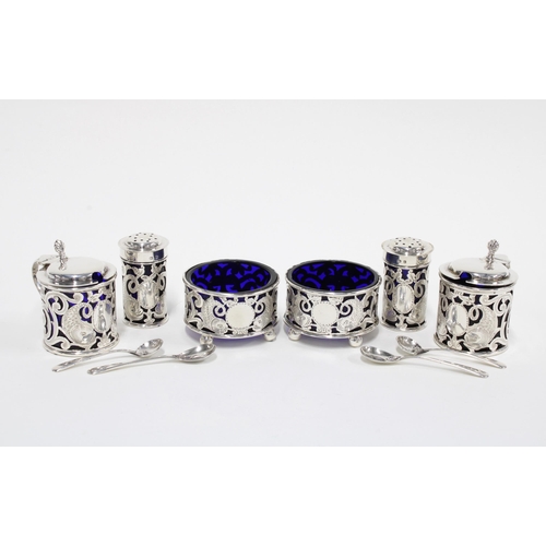 24 - Edwardian six piece silver cruet set by Deakin & Francis, Birmingham 1907, comprising a pair of drum... 