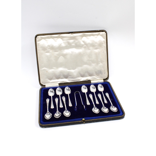 3 - A cased set of twelve silver teaspoons with matching sugar tongs, Sheffield 1911