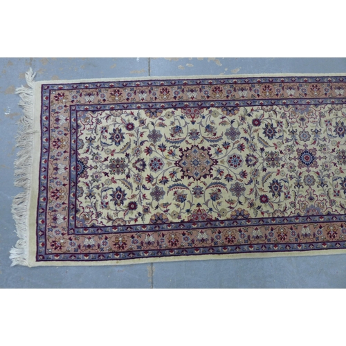 306 - Eastern wool runner with ivory field and allover foliate pattern, 330 x 78cm