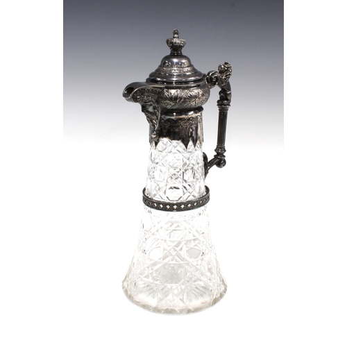 310 - Victorian glass claret jug with Epns mounts, lion handle, 32cm