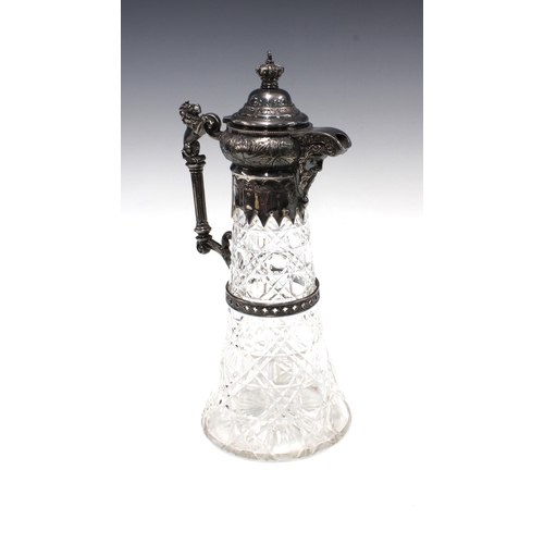 310 - Victorian glass claret jug with Epns mounts, lion handle, 32cm