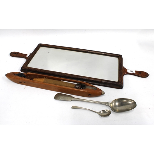 317 - Vintage oak framed Barber's mirror, 73cm, together with a weaving shuttle and two Epns spoons (4)