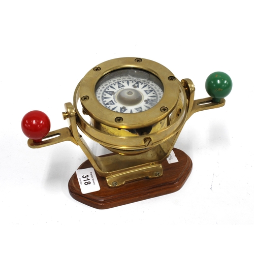 318 - Nautical brass compass, 13 x 24cm