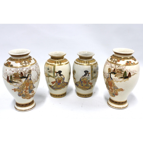 320 - Two pairs of Japanese baluster vases, decorated with figures, taller 23cm (4)