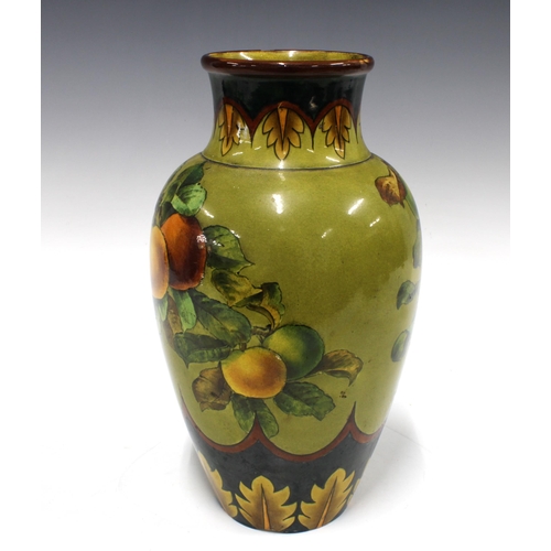 327 - Doulton vase, painted with fruit and blossom, 32cm (a/f)