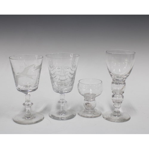 332 - Two coin glass goblets,  one  commemorating the King's Coronation 1937, together with two knop stemm... 