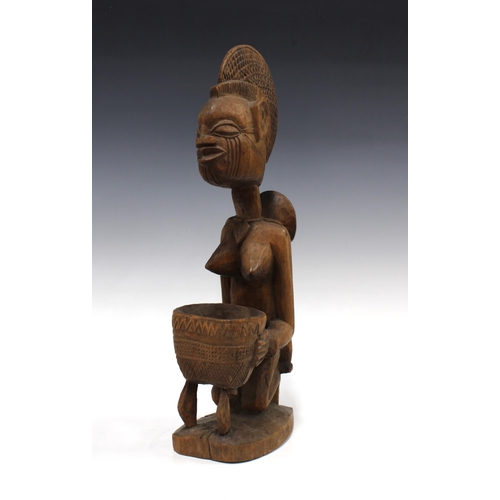 333 - Nigerian carved wood Yoruba maternity figure, 44cm