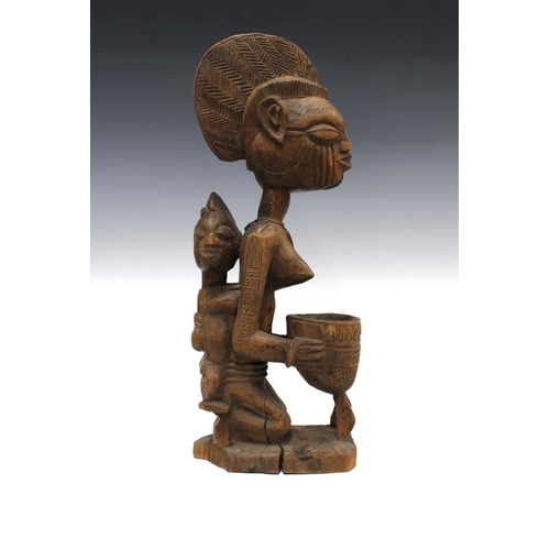 333 - Nigerian carved wood Yoruba maternity figure, 44cm