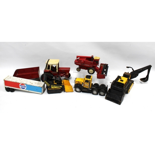 367 - Vintage toy vehicles, including a Tonka digger,, a BuddyL digger and truck, a combine harvester, a t... 