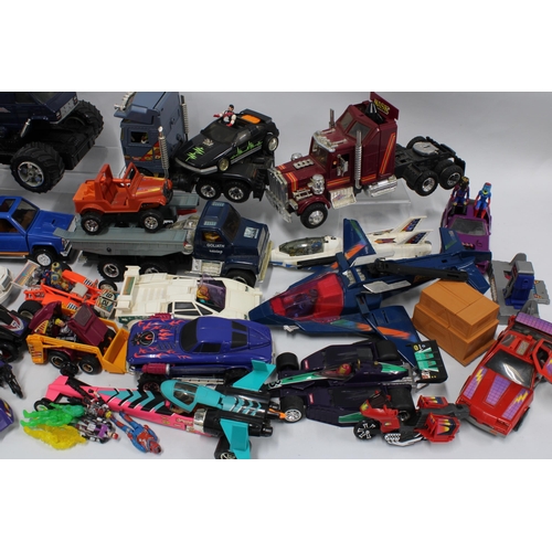 369 - Two boxes of vintage toy vehicles and accessories, including some Mask cars and figures