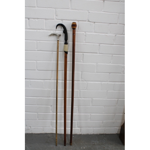 393 - Silver handled cane, together with a hoof handled walking stick and a barrel handled stick, longest ... 