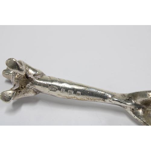 41 - A pair of Edwardian novelty Dachshund silver knife rests, by William Aiken, Birmingham 1904 / 05, 8c... 