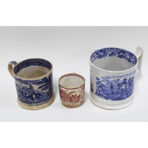 449 - Three Staffordshire transfer printed pottery tankards, two in blue and white the other in puce, (3)