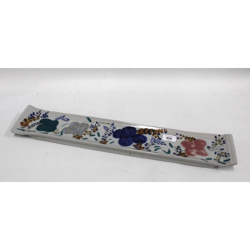 454 - Highland Scotland rectangular dish with handpainted floral pattern, 64cm long