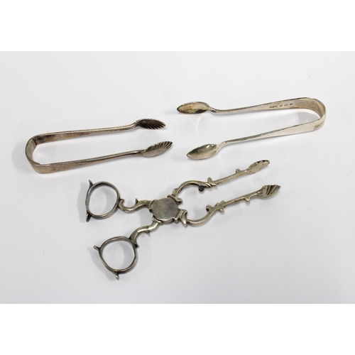 53 - Victorian silver sugar nippers, London 1887, Edwardian silver sugar tongs Birmingham 1908 and unmark... 