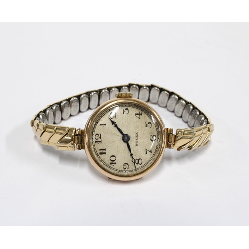 62 - ROLEX,  a ladies vintage 9ct gold cased wristwatch on gold plated strap