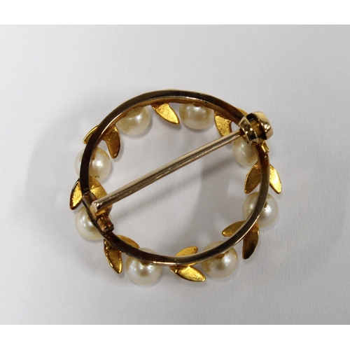 63 - 9ct gold pearl set brooch of circular open form, London 1963,