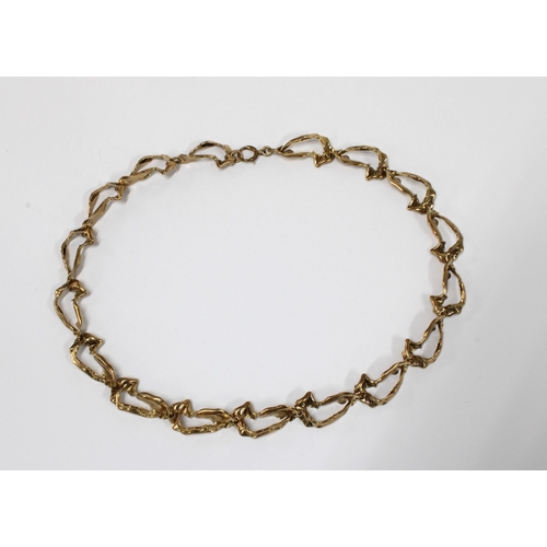 76 - 9ct gold necklace with abstract links, stamped 9ct