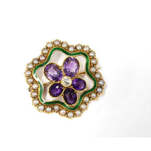 85 - Early 20th century 15ct gold brooch with seed pearls, amethysts and green enamel in the Women's Suff... 