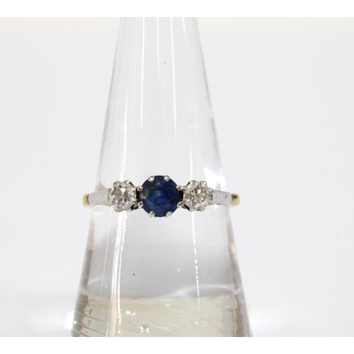 90 - A sapphire and diamond three stone ring set in a white metal setting and unmarked yellow metal, size... 