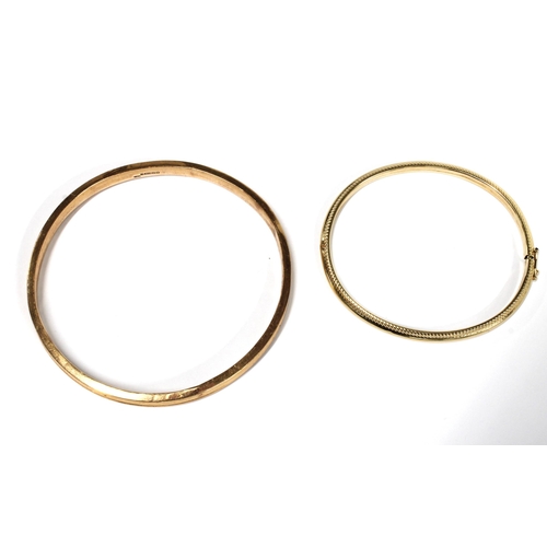 1 - Two 9ct gold bangles, (2)