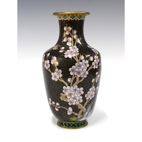 102 - Cloisonne baluster vase with blossoms on a black field, 25cm