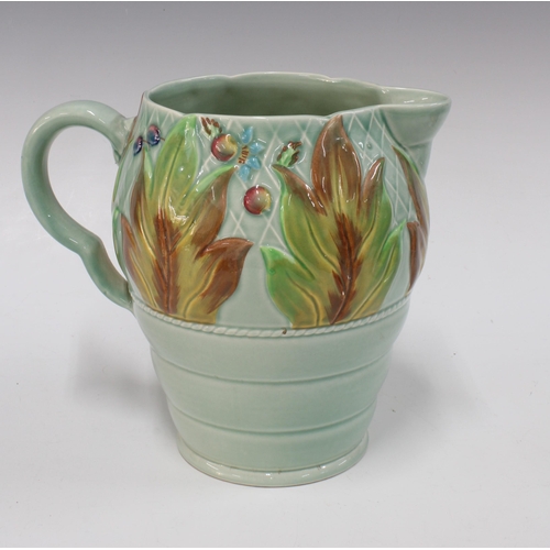 107 - Clarice Cliff Celtic Leaf and Berry pattern jug with a celadon ground, 18cm