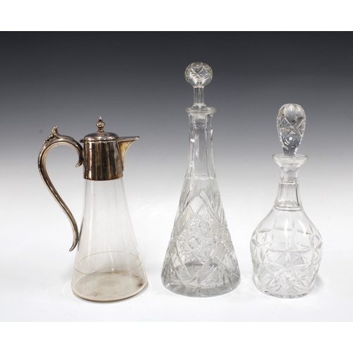 132 - Two glass decanters, taller 36cm, together with an Epns mounted claret jug, (3)