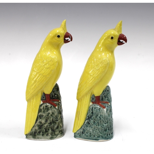 140 - Pair of 20th century Chinese yellow glazed birds , (one a/f) 20cm (2)