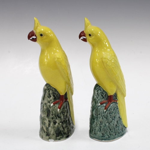 140 - Pair of 20th century Chinese yellow glazed birds , (one a/f) 20cm (2)