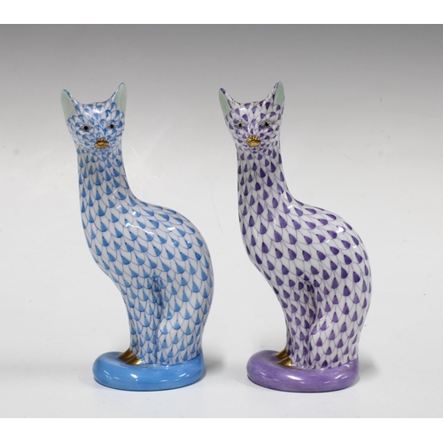 143 - Two Herend handpainted fishnet porcelain cats, one in purple the other blue, printed factory marks a... 