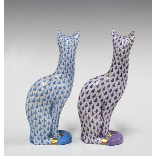 143 - Two Herend handpainted fishnet porcelain cats, one in purple the other blue, printed factory marks a... 