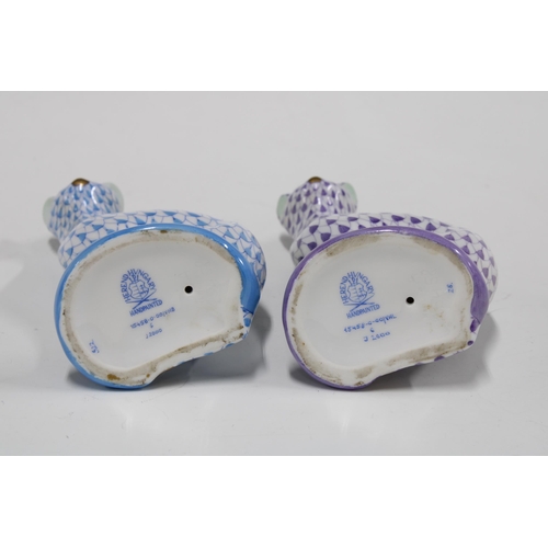 143 - Two Herend handpainted fishnet porcelain cats, one in purple the other blue, printed factory marks a... 