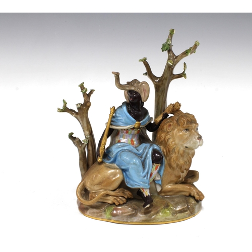 145 - Meissen allegorical figure group representing Africa from the Four Continents series, with blue cros... 