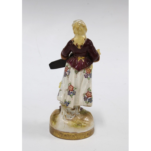 154 - Ludwigsburg figure of a woman playing a guitar, 13cm