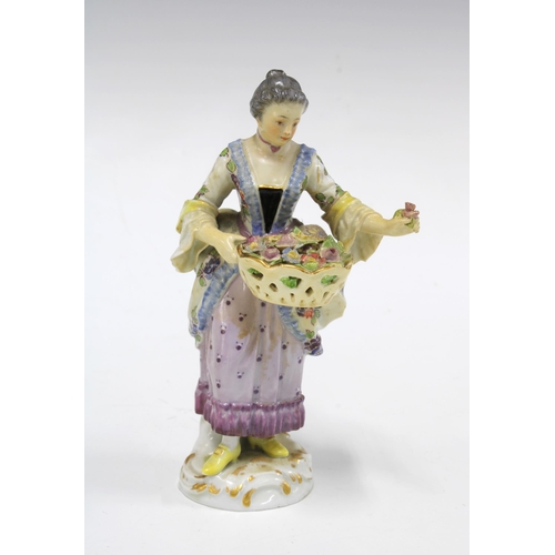 155 - Meissen figure of a flower seller, blue crossed swords mark, circa 1880, 14cm, a/f