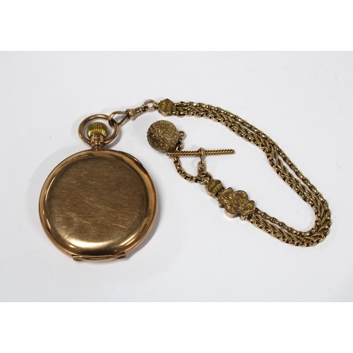 18 - A 9ct gold Hunter pocket watch by Thos. Russell, the signed enamel dial with roman numerals and rail... 