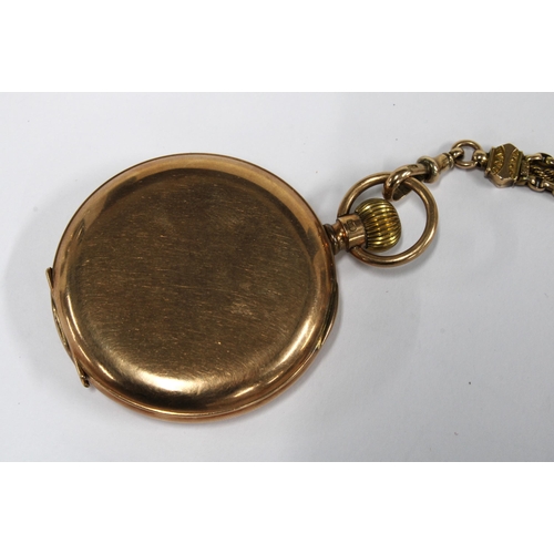 18 - A 9ct gold Hunter pocket watch by Thos. Russell, the signed enamel dial with roman numerals and rail... 