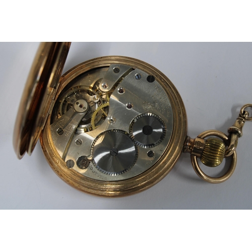 18 - A 9ct gold Hunter pocket watch by Thos. Russell, the signed enamel dial with roman numerals and rail... 