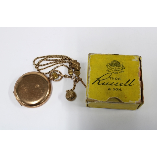 18 - A 9ct gold Hunter pocket watch by Thos. Russell, the signed enamel dial with roman numerals and rail... 