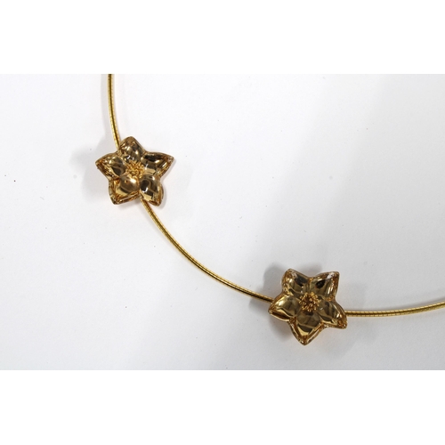 23 - BACCARAT Les Bijoux 18ct gold necklace with five flowerheads, stamped 750, with original box