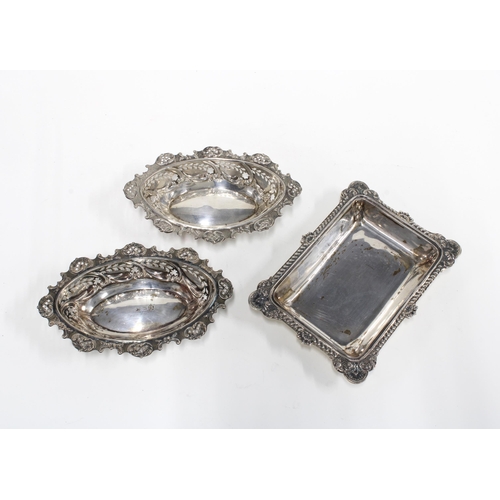 31 - An Edwardian silver dish, Sheffield 1906, 14 x 10cm, a silver bonbon dish, Chester 1903 together wit... 