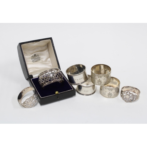 33 - Seven silver napkin rings, various hallmarks (7)