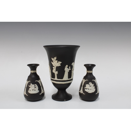 379 - Wedgwood basalt Jasperware vase, with white neoclassical sprigs, 18.5cm, together with two smaller v... 